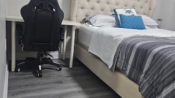 2 bedrooms, desk, iron/ironing board, travel crib