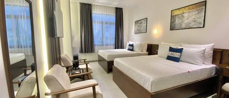 Dobbeltrom – familie | Strykejern/-brett og sengetøy