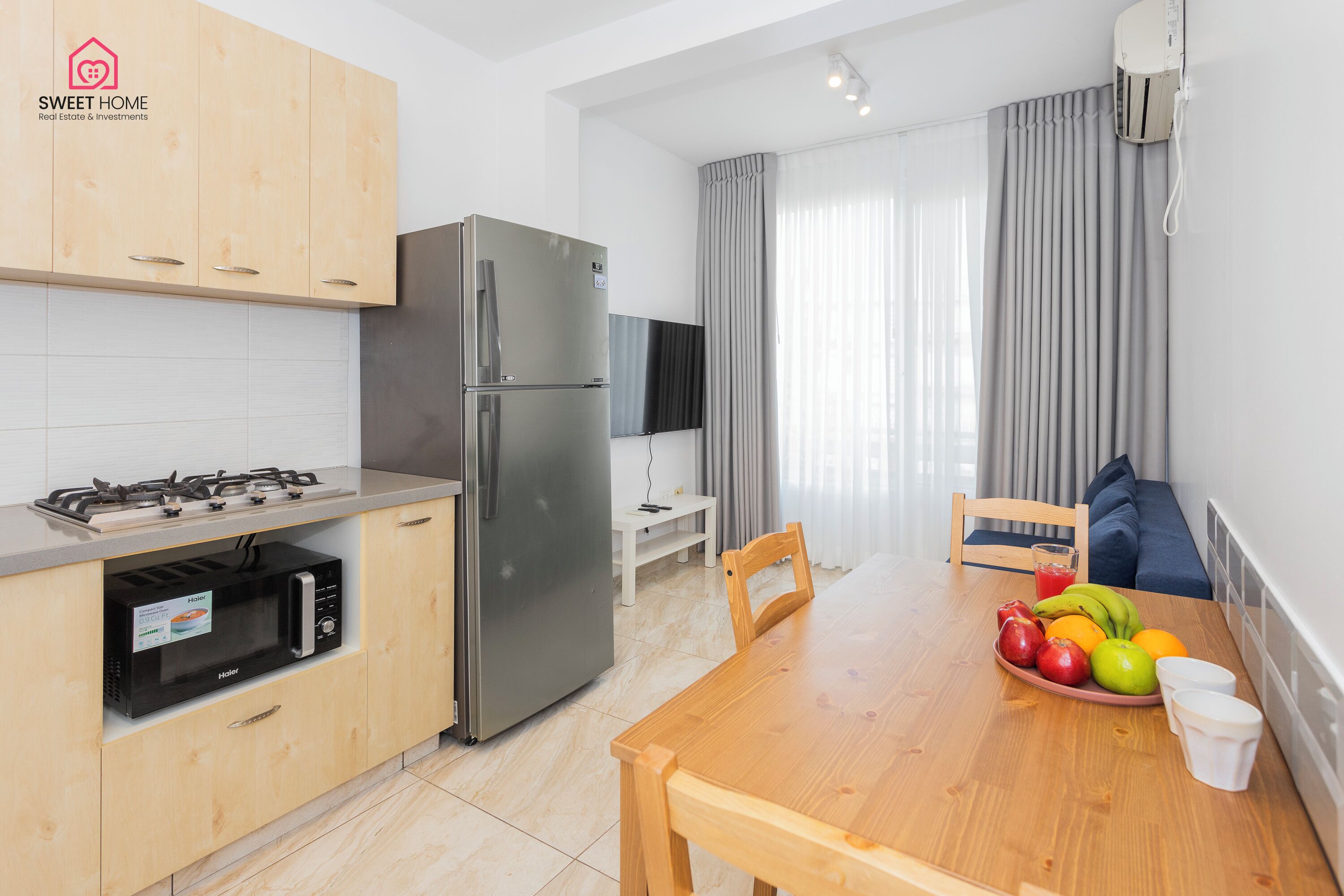 Family Apartment | Living area | Flat-screen TV