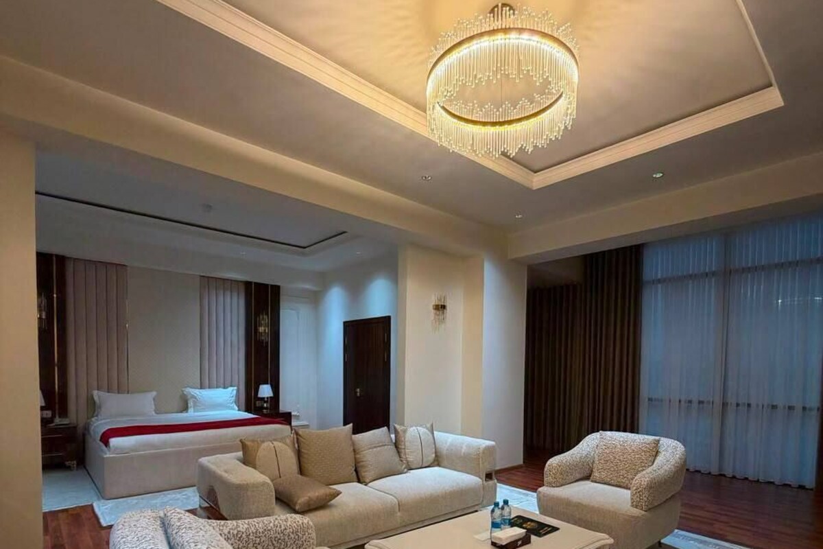 Luxury Suite, City View | Premium bedding, minibar, in-room safe, desk