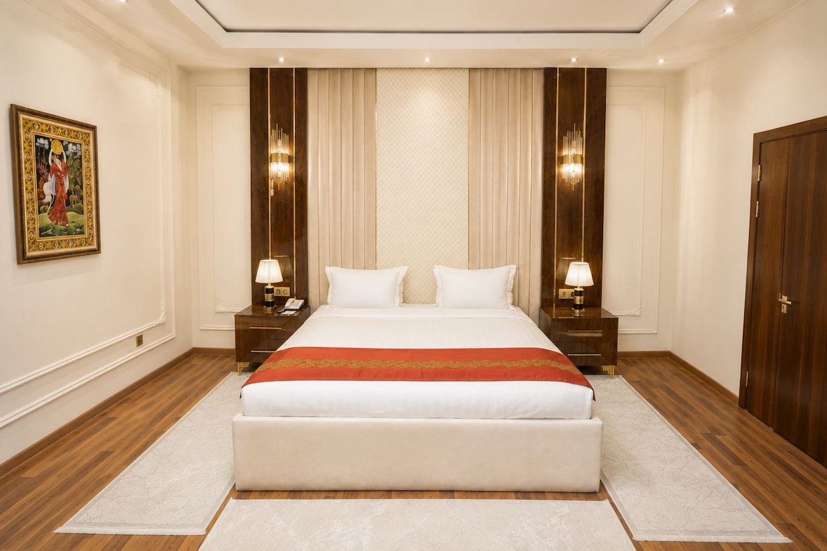 Luxury Suite, City View | Premium bedding, minibar, in-room safe, desk
