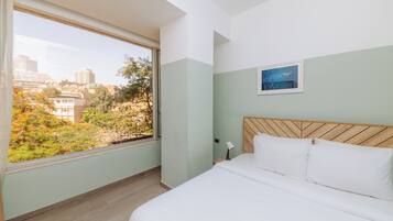 Apartment, Kitchenette, Garden View | Free WiFi, bed sheets