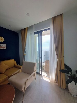 Junior Apartment, Balcony, Beach View | Desk, blackout curtains, soundproofing, iron/ironing board