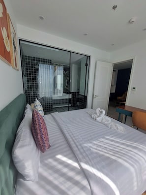 Junior Apartment, Balcony, Beach View | Desk, blackout drapes, soundproofing, iron/ironing board