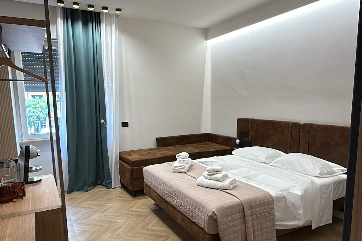 Luxury Quadruple Room, City View | In-room safe, iron/ironing board, free WiFi