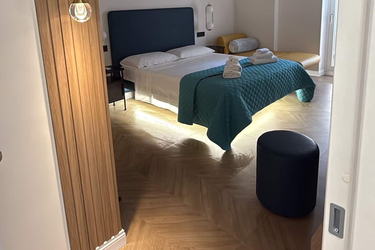 Superior Quadruple Room, Courtyard View | In-room safe, iron/ironing board, free WiFi