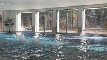 Indoor pool, open 3:00 PM to 9:00 PM, pool loungers