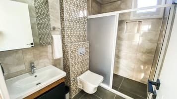 Classic Double Room, Garden View | Bathroom | Shower, hair dryer, slippers, towels