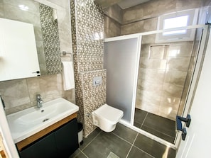 Classic Double Room, Garden View | Bathroom | Shower, hair dryer, slippers, towels