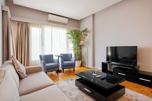 Apartamento, 1 habitación, vistas a la ciudad | Zona de estar