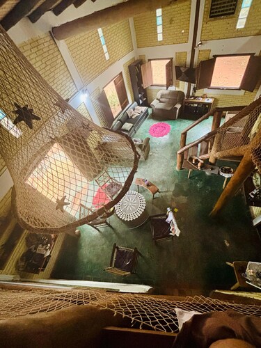 A rustic and charming chalet nestled among centuries-old Jatobá trees!