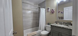 Hair dryer, towels, soap, toilet paper