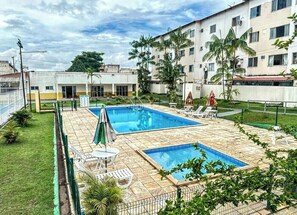 2 outdoor pools, open 9:00 AM to 9:00 PM, pool umbrellas, pool loungers