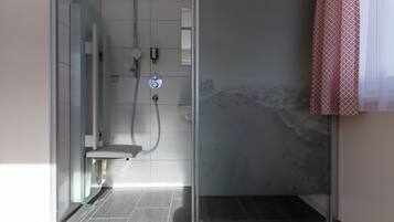 Superior Apartment, 1 King Bed with Sofa bed, Balcony, Mountain View | Bathroom | Shower, hair dryer, towels, soap