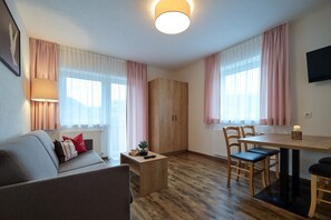 Grand Apartment, Multiple Beds, Balcony, Mountain View | Living area | 29-inch flat-screen TV with satellite channels - Pitztal Living (Jerzens)