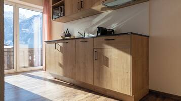 Superior Apartment, 1 King Bed with Sofa bed, Balcony, Mountain View | Living area | 29-inch flat-screen TV with satellite channels