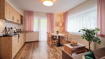 Grand Apartment, Multiple Beds, Balcony, Mountain View | Living area | 29-inch flat-screen TV with satellite channels