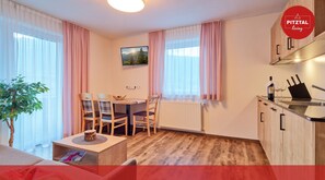 Superior Apartment, 1 King Bed with Sofa bed, Balcony, Mountain View | Private kitchen | Full-size fridge, stovetop, dishwasher, espresso maker