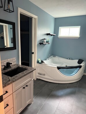 Shower, jetted tub, bidet, towels