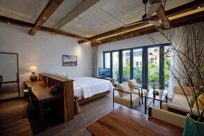 Luxury Studio Suite, City View | Minibar, desk, laptop workspace, soundproofing - Nexus House Retreat Xuan Thuy (Thu Duc)