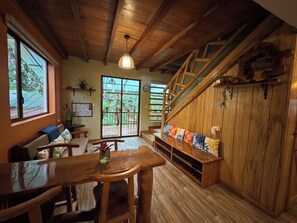 Living area - Lush 5-bdr riverside house in Mindo cloud forest- short walk to charming town (Mindo)