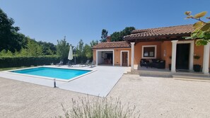A modern villa with a swimming pool, outdoor seating, and a covered patio. - Villa Edo beautiful built villa with private pool in a small village in Istria (ZMINJ)