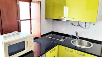 Apartamento, 1 quarto, varanda | Cozinha americana privada