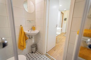 Shower, hair dryer - 2 bedroom apartment in the Dob St., Emerald (Budapest)