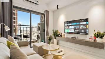 Premium Apartment, 2 Bedrooms, Non Smoking, City View | Living area | 24-inch TV with digital channels