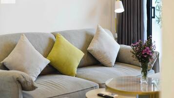 Premium Apartment, 2 Bedrooms, Non Smoking, City View | Living area | 24-inch TV with digital channels