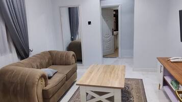 Royal appartement, uitzicht op tuin | Woonruimte