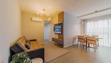 Apartemen Comfort | Area keluarga | TV LED