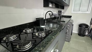 Comfort Apartment | Private kitchen | Fridge, microwave, stovetop, blender