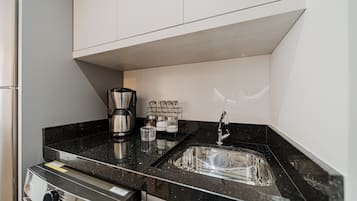 Comfort Apartment | Private kitchen | Fridge, microwave, stovetop, blender
