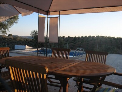 Traditional Cortijo near Cordoba, with swimming pool and surrounded by olive groves.