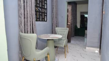 Deluxe Apartment, Pool View | Living area