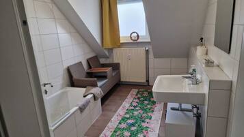 Hair dryer, towels, soap, shampoo