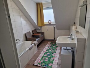 Hair dryer, towels, soap, shampoo