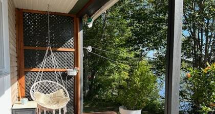 Chalet bord de l'eau cozy et chaleureux