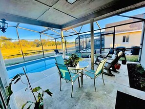 Outdoor dining - Lake View 3BR Villa w/ Private Pool – 15 Min to Disney (Kissimmee)