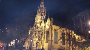 A historic church with a tall spire, large windows, and a clock tower. - Lille Centre Lille Europe station (Lille)