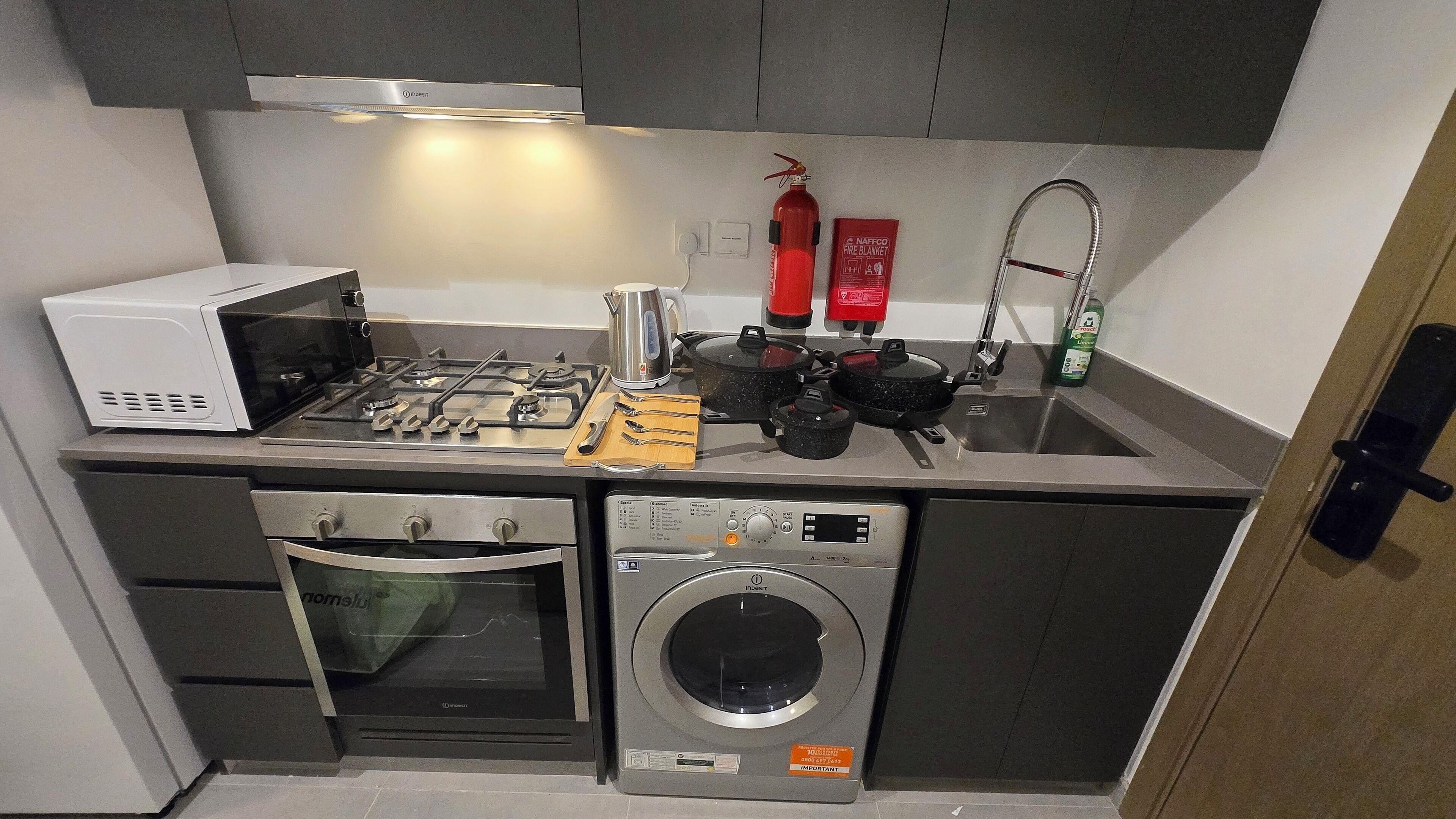 Luxury Studio, Courtyard View | Private kitchen | Full-size fridge, microwave, oven, stovetop