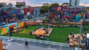 An outdoor event with a stage, seating, and a large mural. - Amazing location in the heart of Gatineau.#5 (Gatineau)