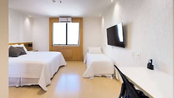 Deluxe Triple Room, 1 Bedroom, Non Smoking, City View | In-room safe, blackout drapes, iron/ironing board, free WiFi