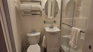 Shower, towels, soap, shampoo