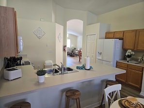 Microwave, oven, stovetop, dishwasher - Disney 4 bed pool & spa home with game room, gated resort, free wi-fi, spacious (Kissimmee)