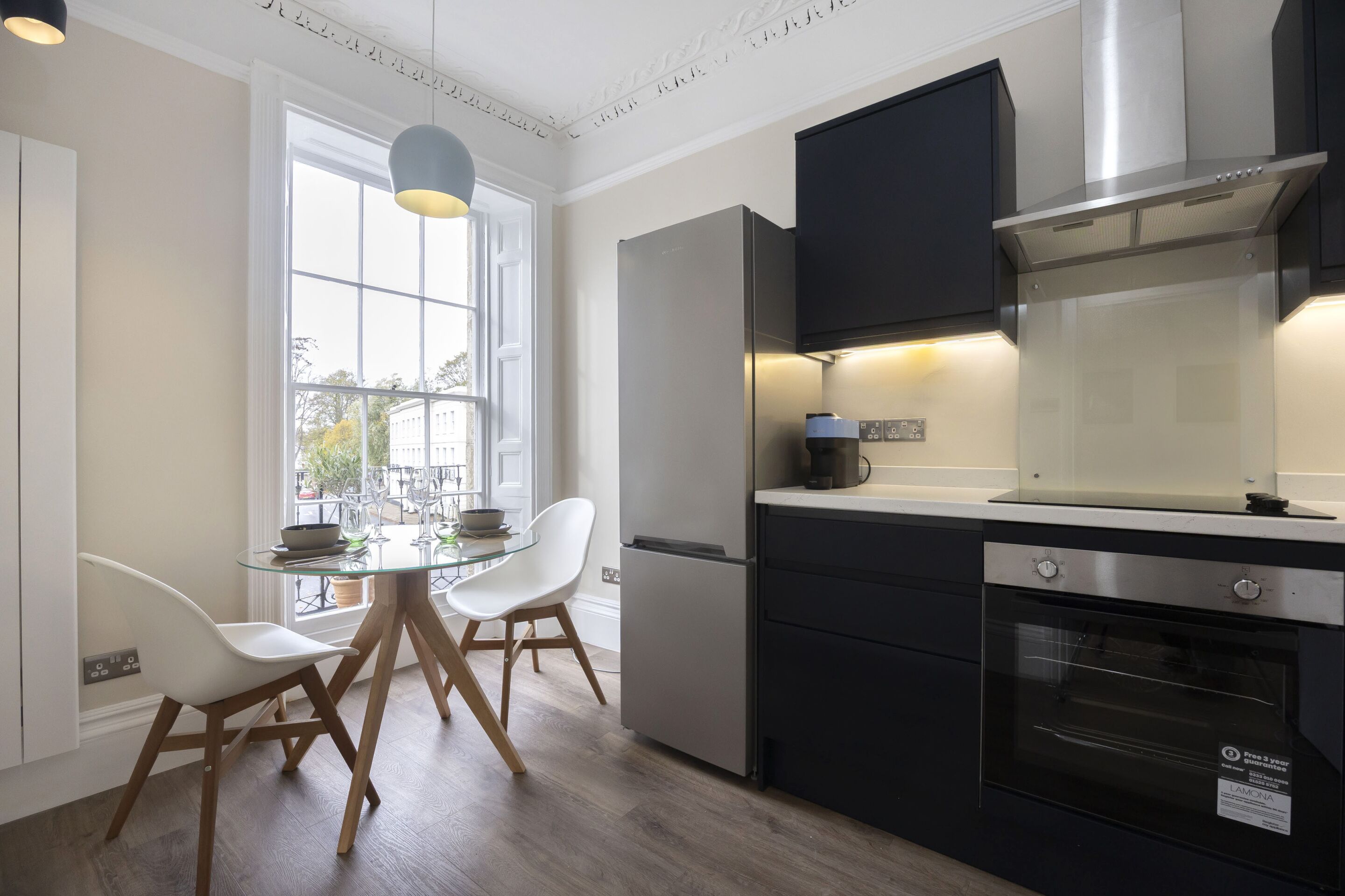 Fridge, oven, coffee/tea maker, cookware/dishes/utensils