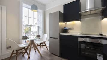 Fridge, oven, coffee/tea maker, cookware/dishes/utensils