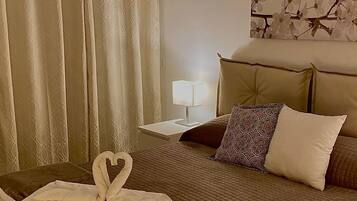 Coffres-forts dans les chambres, bureau, fer et planche Ă repasser