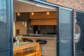 Outdoor dining - Hobart Family Retreat | Spa & Dual Living Home (Sorell)